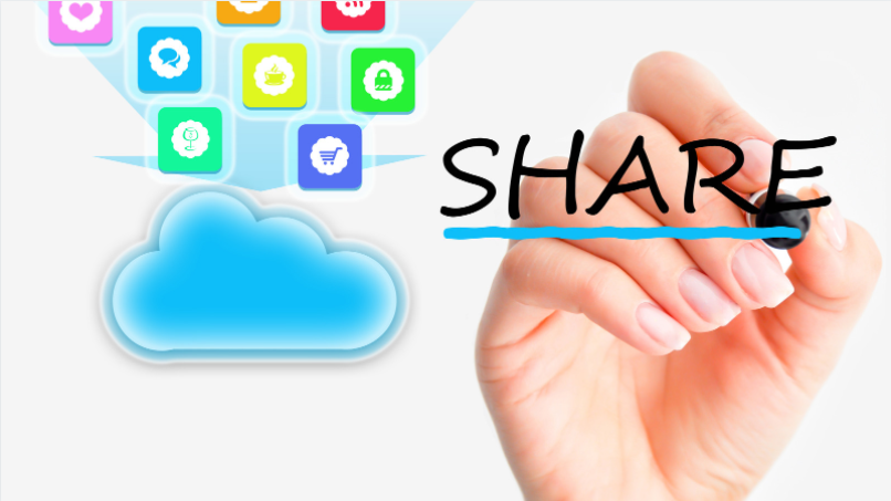 a hand writing "SHARE" with clouds in the background